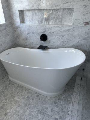 Bath tub and faucet installation