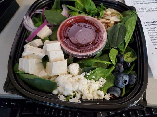 Spinach salad with tofu. Healthy portion of good stuff.