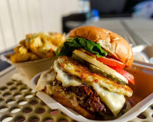 1/2 lb burger w/egg and garlic fries. $17