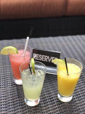 Happy hour $5 margaritas. Strawberry, traditional and mango.