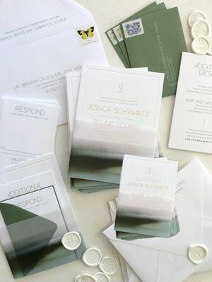 Letterpress and foil wedding invitations with vellum wrap and seal