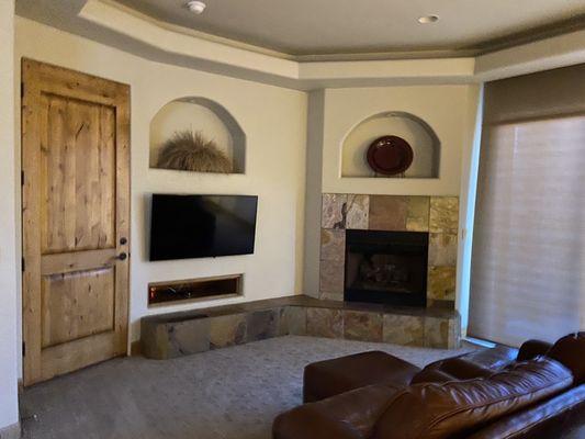 Fireplace and comfy seating.