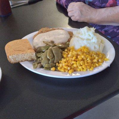 Country Fried Steak,  Corn, meshed potatoes, green beans,  and corn bread