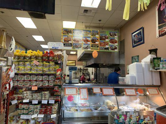 The kitchen inside a convenient store/deli