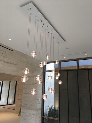 Light Fixture Installation - very cool Bocce Ball Chandelier