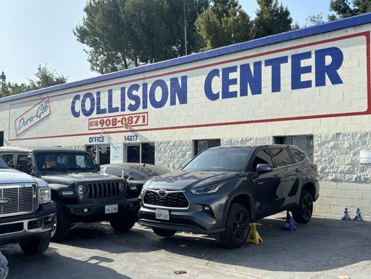 Stock rims painted black on 2021 Toyota Highlander Hybrid