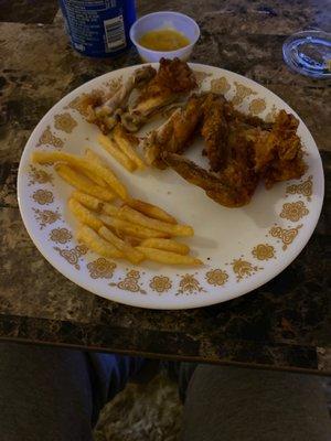 French fries chicken wings and honey mustard and my Pepsi