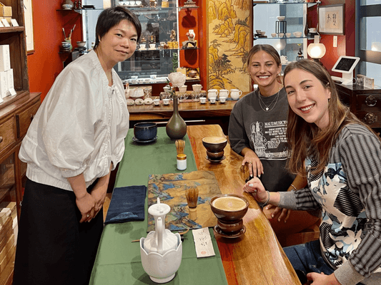 Tea Master Olivia with customers enjoying Song Dynasty Dian Cha