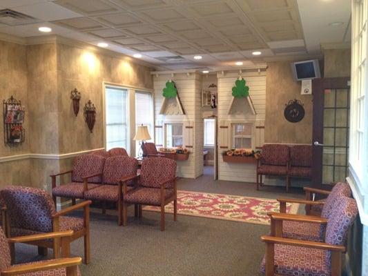 The patient area is complete with a cottage-like play house that kids can actually go inside and play while waiting.