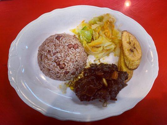 Oxtails and rice and peas