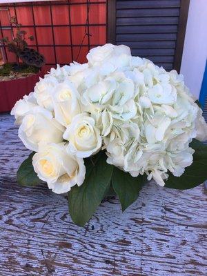 Lush & Low arrangement with Hydrangea and white roses!