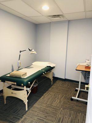 Our warm and inviting treatment rooms! Come get acupuncture, massage therapy, and physical therapy with our team!