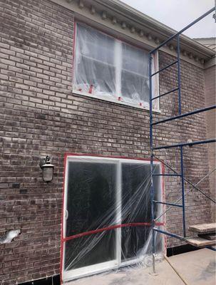 Tuck pointing and waterproofing house