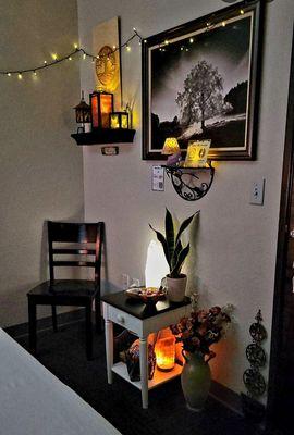 Relaxing treatment room, beautifully decorated.