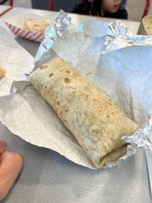 Traditional burrito with spicy carnitas.