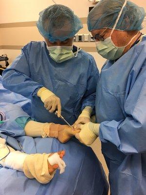 Dr. Petersen & Dr. Vogen in the operating room.