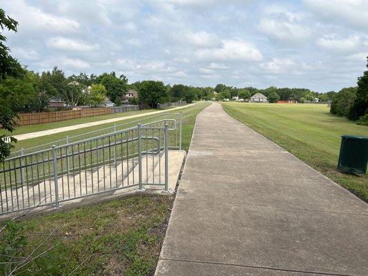 Paved trail on the other side of the cul-de-sac