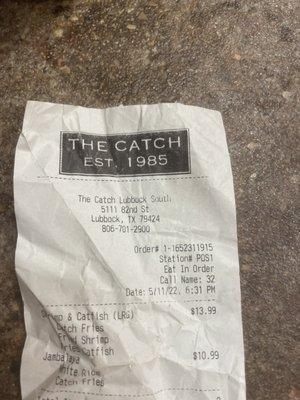 My receipt from The Catch where I was charged $13.99 for the 1 filet, 2 shrimp and hush puppies