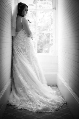 Wedding gown alterations. Let out at back, added bustle, lowered back