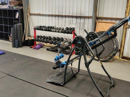 Inversion table and personal training studio shed.