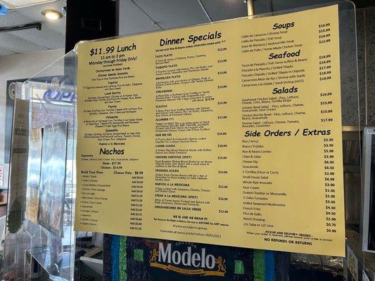 Menu posted at the side of the counter