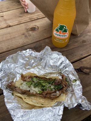 Shredded Brisket Taco and mango Jarritos