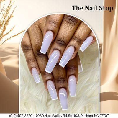 Soft pink nails paired with a modern white French tip for a fresh and stylish twist on a classic look. Elegant and timeless!