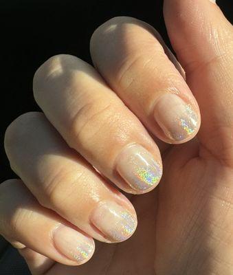 Gel mani with iridescent chrome by Kelly.