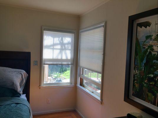 Pleated shades in a bedroom of a beautiful Palo Alto home. The customer was looking for some light filtering shades that soften the room.