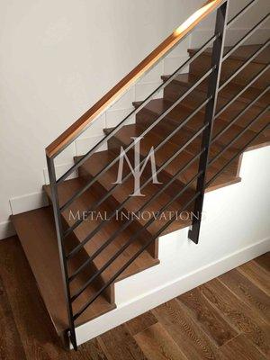 Horizontal Rod Rails with combination wood cap, constructed with cold roll steel and always TIG welded, never MIG welded