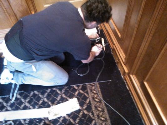 Our talented installer Installing Double Border Carpet