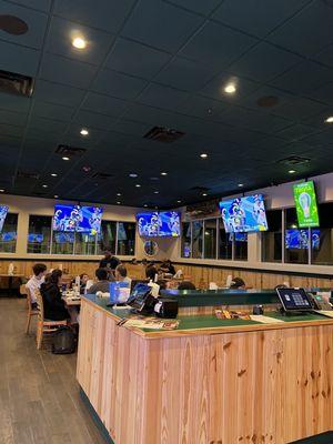 Dining room with so many TV's