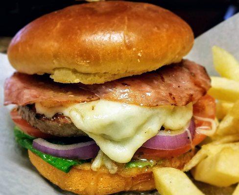 Amici Burger Fresh half pound patty with salami, mozzarella, Italian dressing, lettuce, tomato and onion.