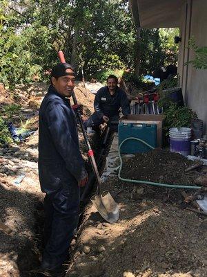 Digging with a smile. Making sure the installation is perfect.