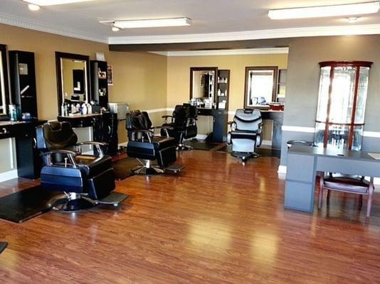 Updated barber shop with rich colors and comfortable setting