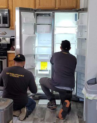 New fridge being installed