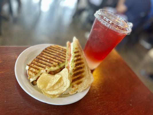 Caprese sandwich, potato chips and a red mango lemonade.  Yummy!