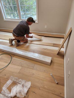 This project is Viking Modern Loft Aspen Meadow engineered hardwood  expertly installed by Karpetmart.