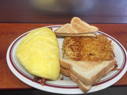 Meat Lovers Omelette with hash browns and toast