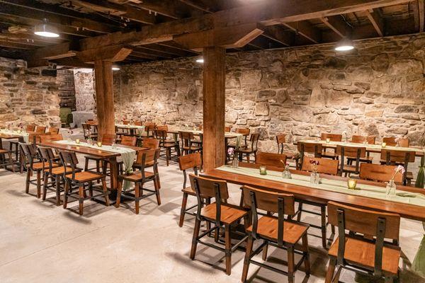 Downstairs tasting room - has its own fully stocked bar & cozy barrel room. Can be rented out for private parties