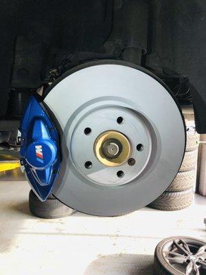 Coated German made rotors installed on this BMW to prevent rust