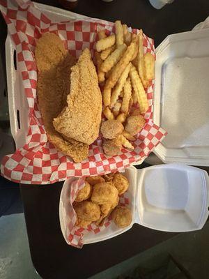 Food. Catfish, shrimp and scallops with fries.