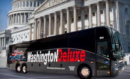 Washington Deluxe Bus in front of Washington famous landmark. Can you name it?