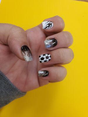 Soccer ball accent nail, flaming soccer ball accent nail, and black & silver glitter ombre