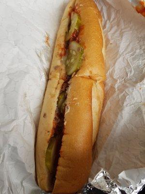 Cheesesteak with extra mayonnaise, ketchup, pickles, and fried onions