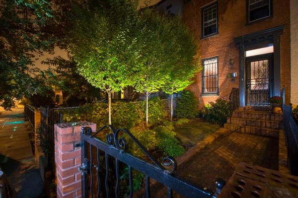 Even a few lights can make a dramatic difference for your DC row home.