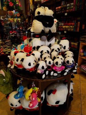 Cute panda plushies wearing traditional Chinese outfits