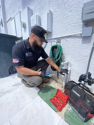 Broward Plumbing, professional technician in action, changing main ball valve for property