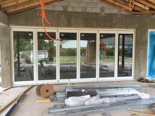 Impact folding doors