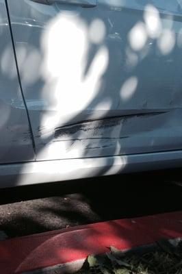 Door damage to 2014 Ford Mustang